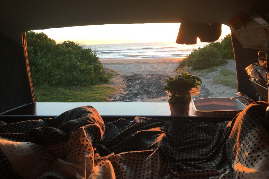 wild camping beachfront Australia road trip sunrise