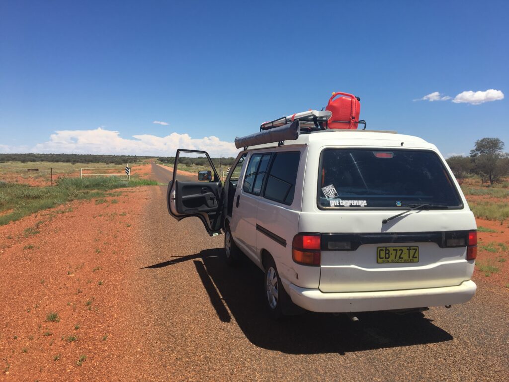 perfect camping weather Australia red road outback campervan